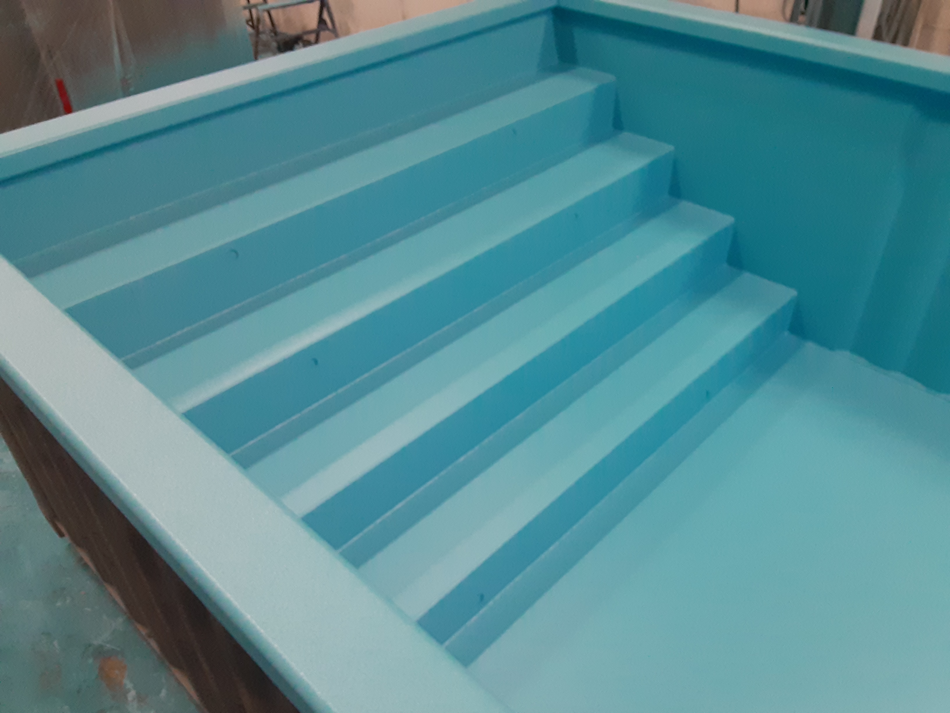 An above ground pool coated with LifeLast